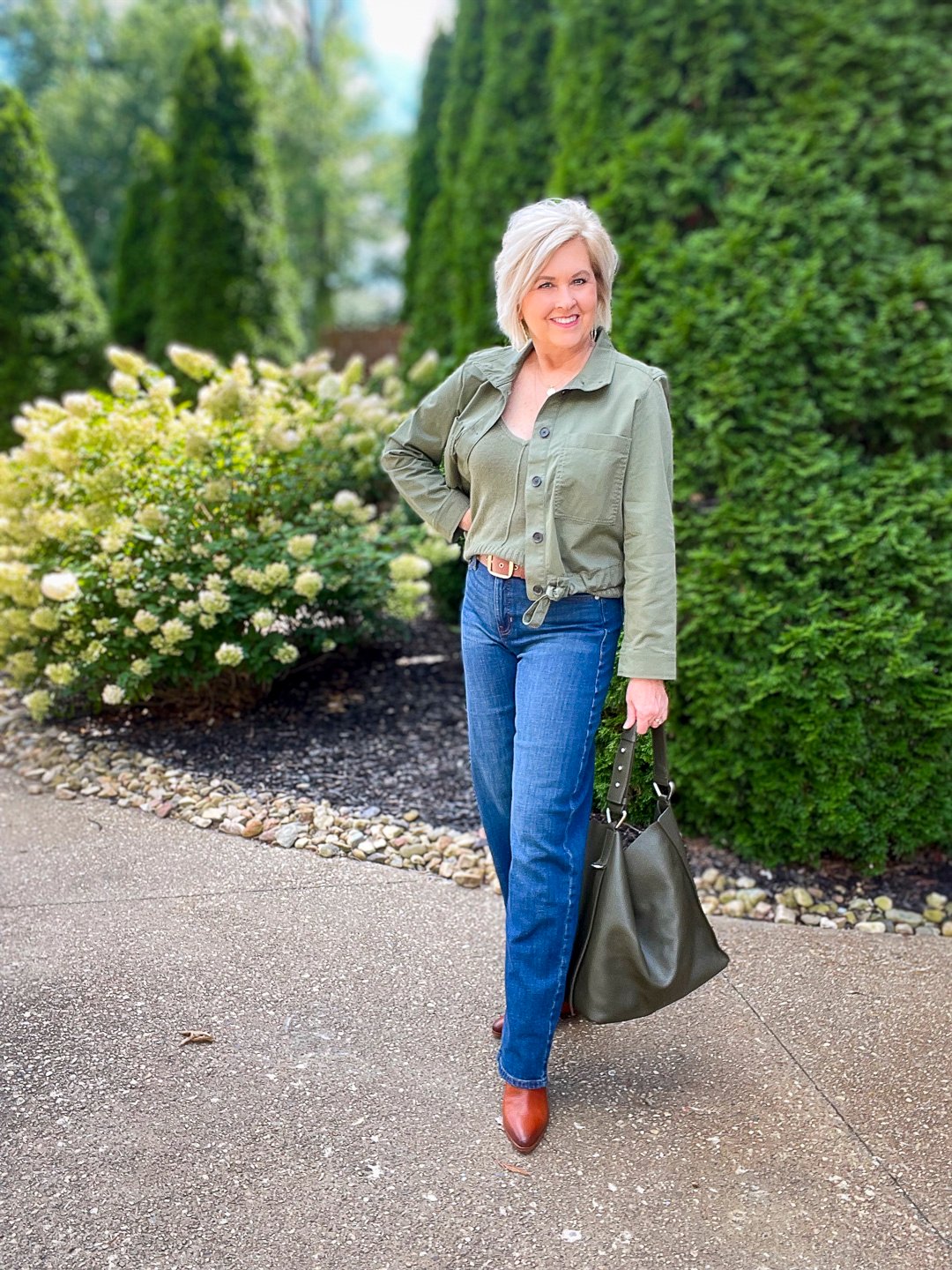 Over 40 Fashion Blogger, Tania Stephens is wearing an olive green jacket and sweater tank from Banana Republic16
