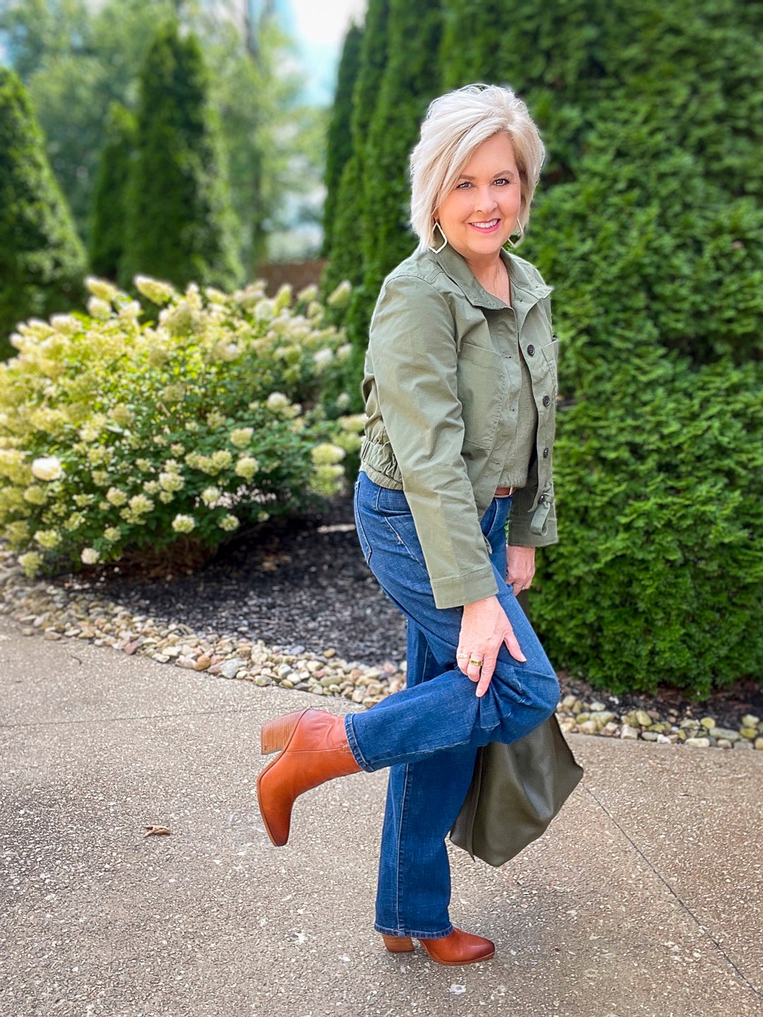 Over 40 Fashion Blogger, Tania Stephens is wearing an olive green jacket and sweater tank from Banana Republic15