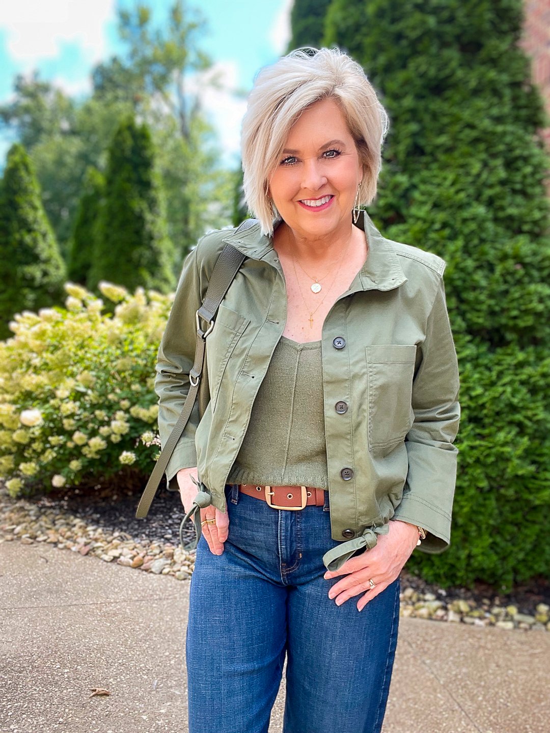 Over 40 Fashion Blogger, Tania Stephens is wearing an olive green jacket and sweater tank from Banana Republic1