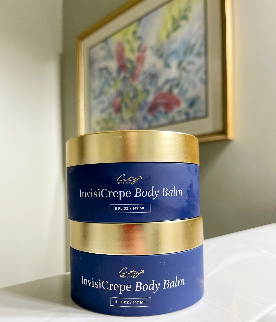 Over 40 Fashion Blogger, Tania Stephens is wearing a blue top and trying City Beauty's Inviscrepe Body Balm20