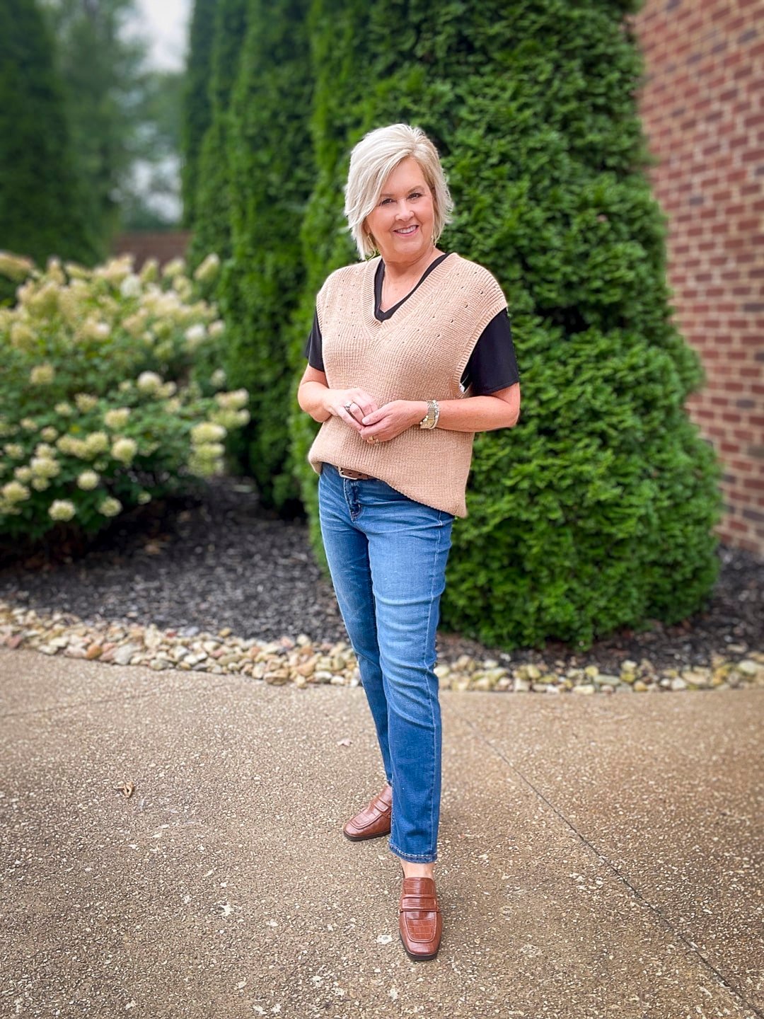 Over 40 Fashion Blogger, Tania Stephens is wearing a tan vest for fall from Walmart17