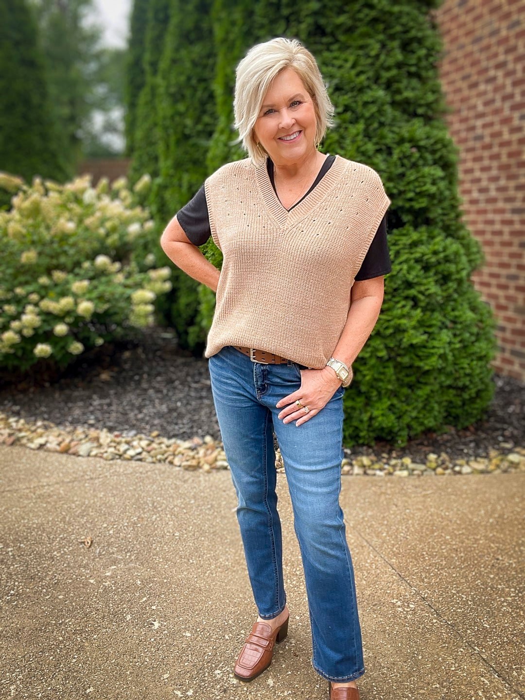 Over 40 Fashion Blogger, Tania Stephens is wearing a tan vest for fall from Walmart13