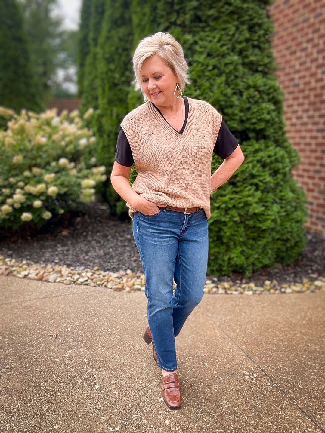 Over 40 Fashion Blogger, Tania Stephens is wearing a tan vest for fall from Walmart19