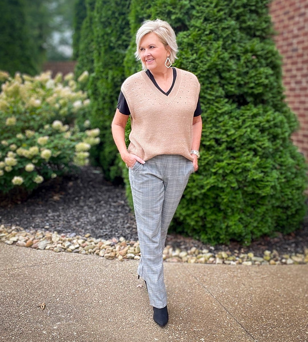 Over 40 Fashion Blogger, Tania Stephens is wearing a tan vest for fall from Walmart23