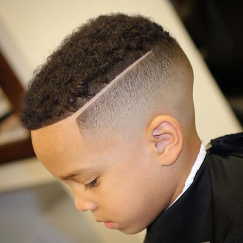 High Skin Fade with Part and Curly Top